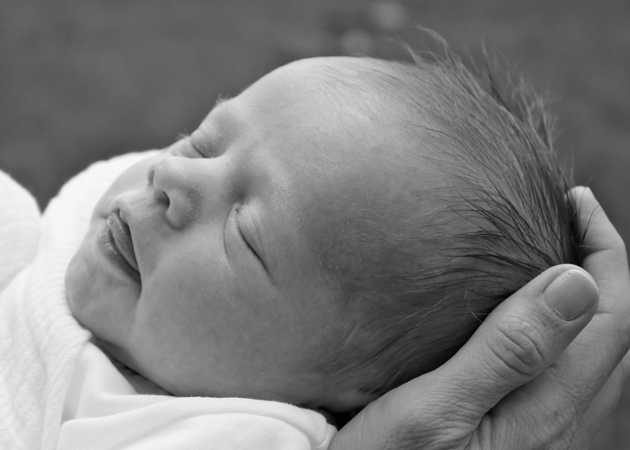 Capturing the closeness of a new infant in Wellesley MA by Echo Cove Photography